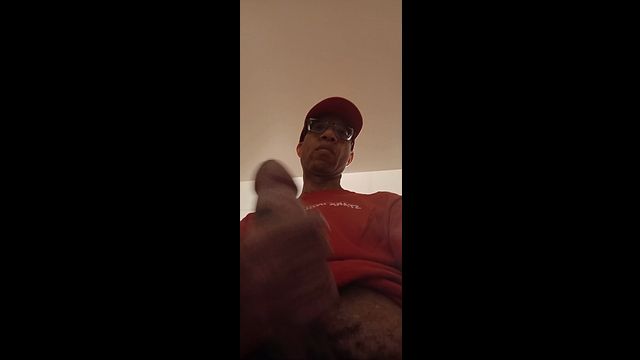 BBC Masturbates in Movie Theater Bathroom Stall for Intense Solo Session
